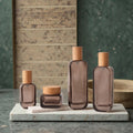 Eco-Friendly Square Pump Bottle Bamboo Lid Customizable Frost Electroplated Lotions Cosmetics Storage 30ml 50ml 100ml Carton