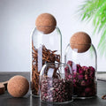Wholesale Building Glass 500ml 800ml 1000ml 1300ml Transparent Borosilicate Glass sealed Storage Jar with Cork Ball Lid Glass
