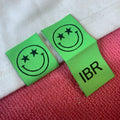 Smile Face logo Bright Green Woven Hem Label for BeanieBook Cover Fold Stitching logo Clothing Hem Tag for Sleeve