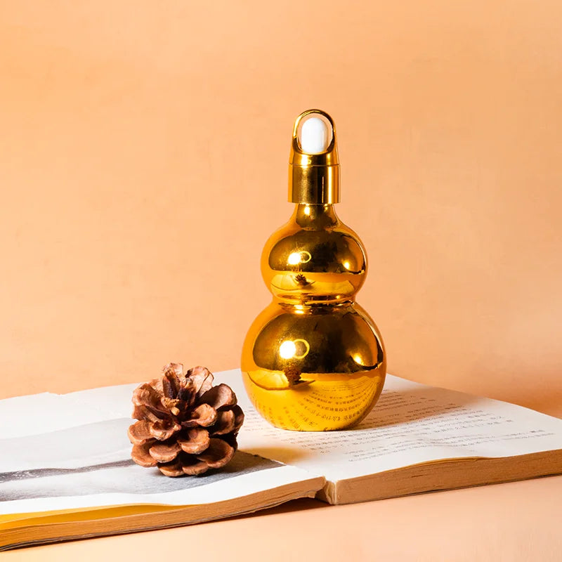 Wholesale Essential Oil Bottle 10ml Gourd-shaped Gold Glass Essential Oil Perfume Bottle With Dropper Bottle