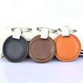 Factory Wholesale Custom Embossed Engraved Logo Designer Personalized Pu Leather Round Keychain