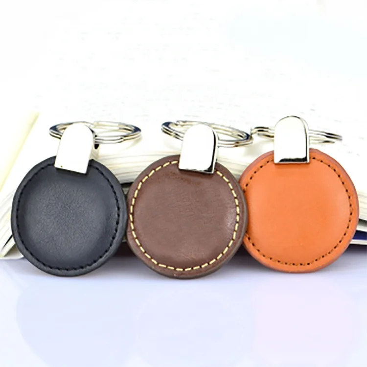Factory Wholesale Custom Embossed Engraved Logo Designer Personalized Pu Leather Round Keychain