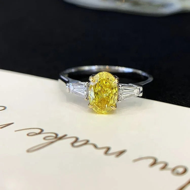 Ruyi Luxury 1-Carat Oval Cut Yellow Diamond Ring VS Clarity 18K Gold with Baguette Diamonds for Weddings with IGI Certificate