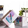 Custom Printed CMYK Printing Varnished Surface Portable Tote Cardboard Paper Bag Luxury Clothing Garment Retail Gift Exhibition