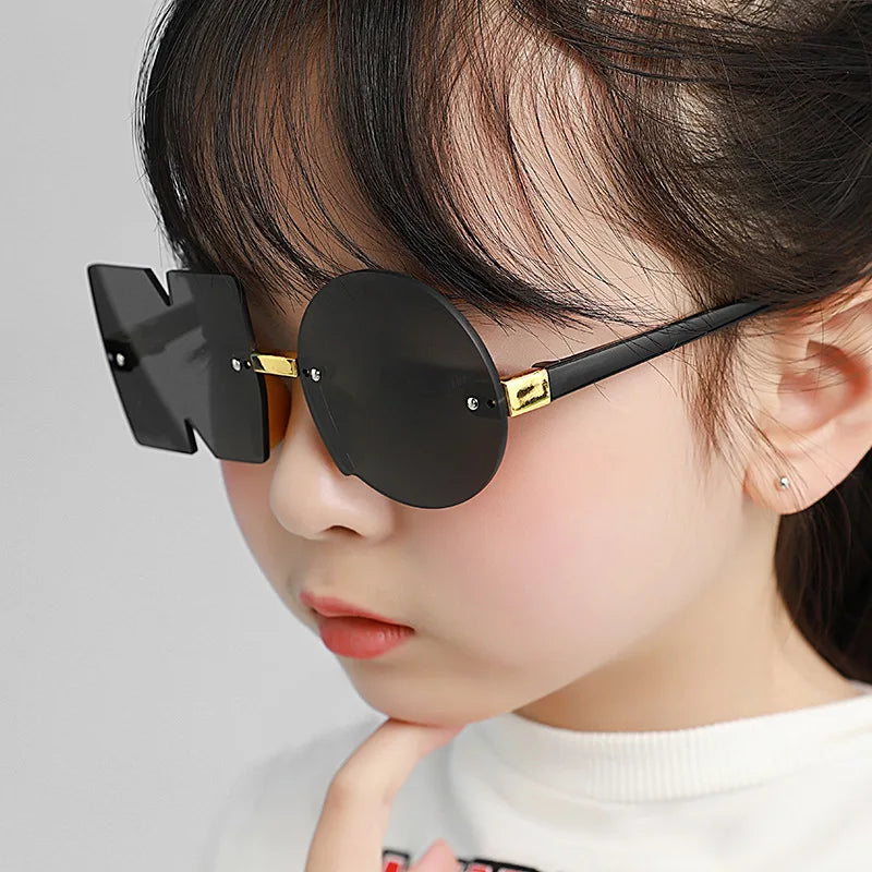 UNOC 2022 Fashion No Shape Unisex Kids Rimless PC Sunglasses 7 Colors Customizable Lens Colors UV400 Protection Outdoor Party