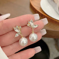 AA00991 Fashion Cute Exquisite Flower Butterfly Stud Pearl Crystal Earrings White for Women Jewelry Wedding Party Gifts Alloy