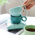 Factory Direct Custom Macaron Pillow Shaped Ceramic Cup and Saucer Set Porcelain Cappuccino Milk Tea Breakfast Mug Wholesale