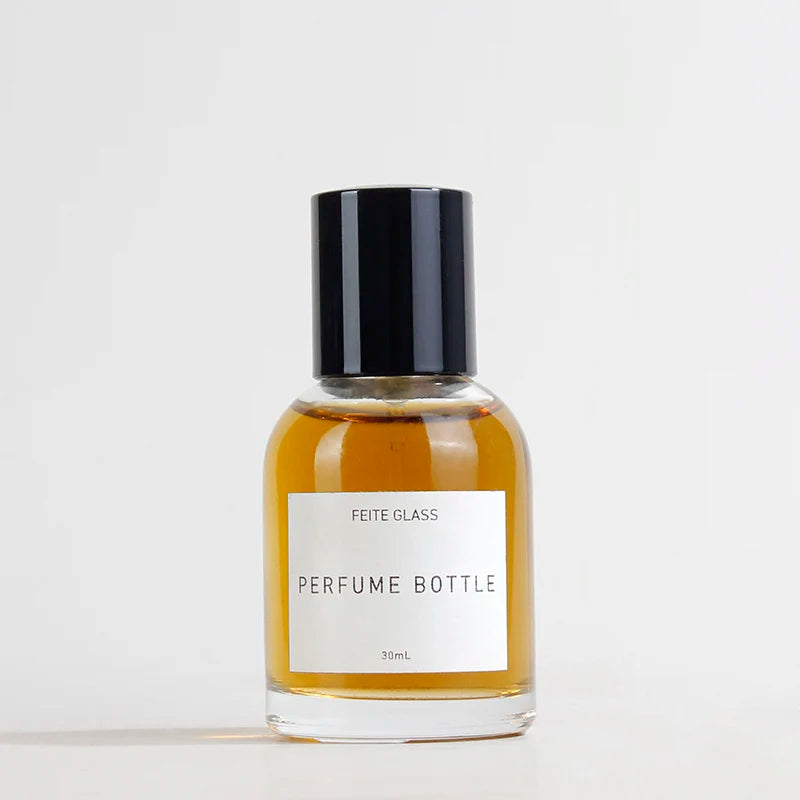 Custom Logo Empty Perfume Bottle 30ml 50ml 100ml Round Glass Perfume Spray Bottle With Black Cap