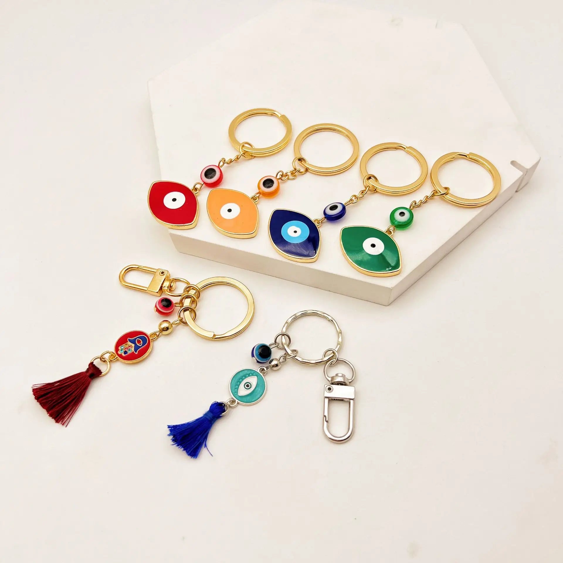 Wholesale Cute Car Key Holder Electroplating Gold Color Evil Eye Key Chain With Tassel
