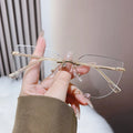New Design Rimless Metal Hinges Cat Eye PC Material Anti Blue Light Computer Glasses Frames for Women