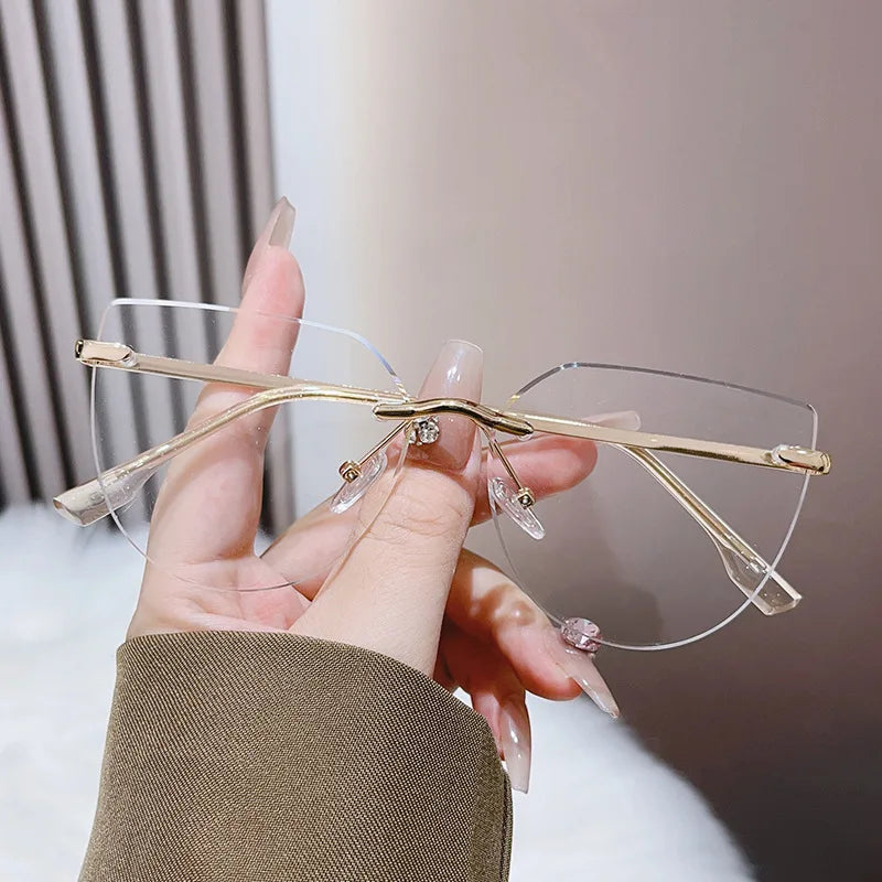 New Design Rimless Metal Hinges Cat Eye PC Material Anti Blue Light Computer Glasses Frames for Women