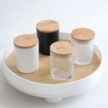 Chinese Manufacturer Cylinder Matte White Black Frosted Glass Candle Jar With Cork Lid OEM