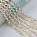 Zhuji Wholesale 5-6mm Yellow Color Top Hole Rice Freshwater Pearl Strands