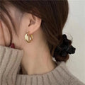 Wholesale Women's Earrings Light Luxury Senior Sense Gold Hooping Ear Buckle Simple Temperament Cross Twist Earrings
