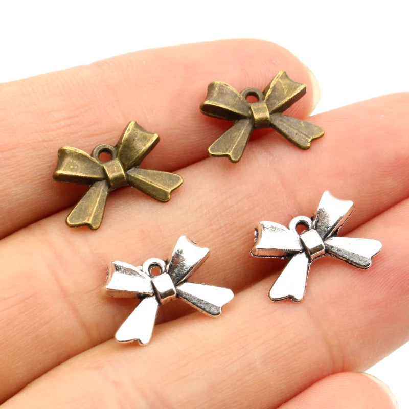 30pcs/lot 15x10mm Antique Silver Plated Bronze Small Bow-knot Handmade Charms Pendant:DIY Jewelry Findings for Bracelet Necklace