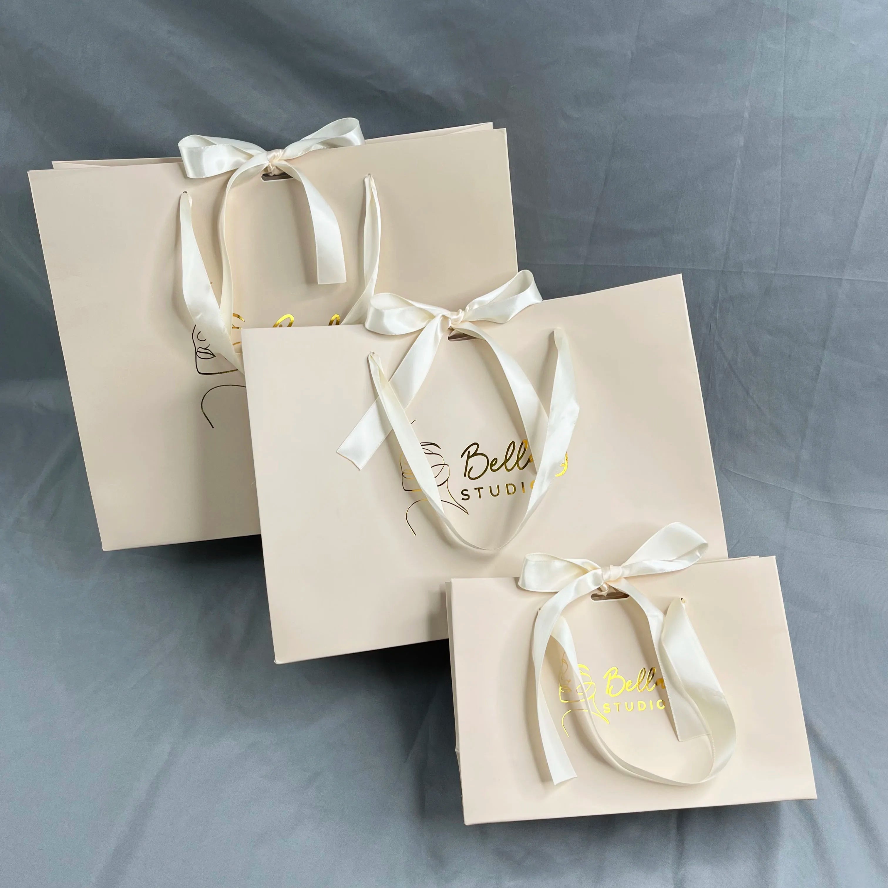 Custom Luxury Beige Clothes Store Retail Packaging Gift Carry Bags Boutique Shopping Paper Bags with Your Own logo