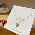 HOVANCI 4 Delicate High Polished Gold Plated Heart Pendant Necklace Titanium Steel Hollow Heart Clavicle Necklace