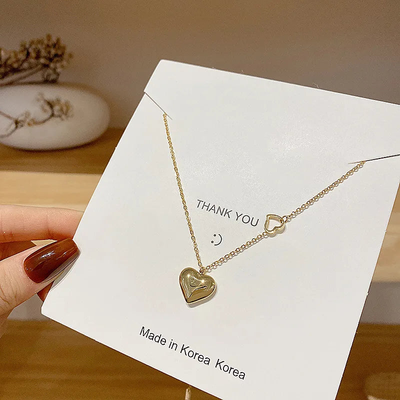 HOVANCI 4 Delicate High Polished Gold Plated Heart Pendant Necklace Titanium Steel Hollow Heart Clavicle Necklace