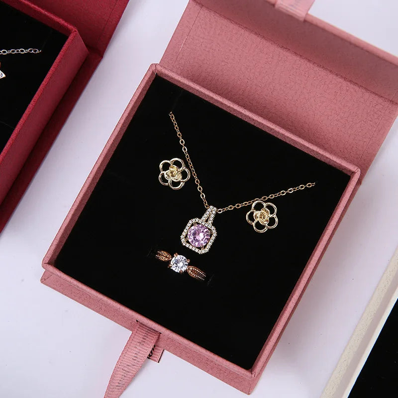 Book-Shaped Rigid Boxes with Ribbon Bow Ring Earrings Necklace Packaging Flip Jewelry Box and Gift Paperboard Carton