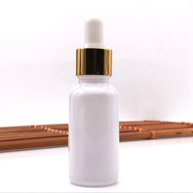 Wholesale 5ml-100ml White Essential Oil Glass Bottle With Dropper
