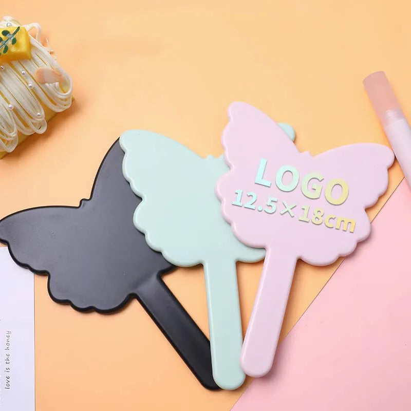 YUE Wholesale New Customized LOGO Butterfly Handle Mirror Irregular Cute Makeup Mirror Girl Bag Handheld Mini Mirror
