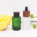 Flat Shoulder Cosmetic Green Bottle Glass Dropper 15 ml 30ml with Dark Wooden Top