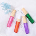 Good Quality 9colors Cosmetic Packaging 10ml Frosted Perfume Glass Spray Essential Oil Bottle with Wood Grain Sprayer