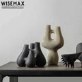 WISEMAX FURNITURE Modern Home Decor Irregular Shape Handmade Artist Vase Natural Color Ceramic Vase with Four Hole