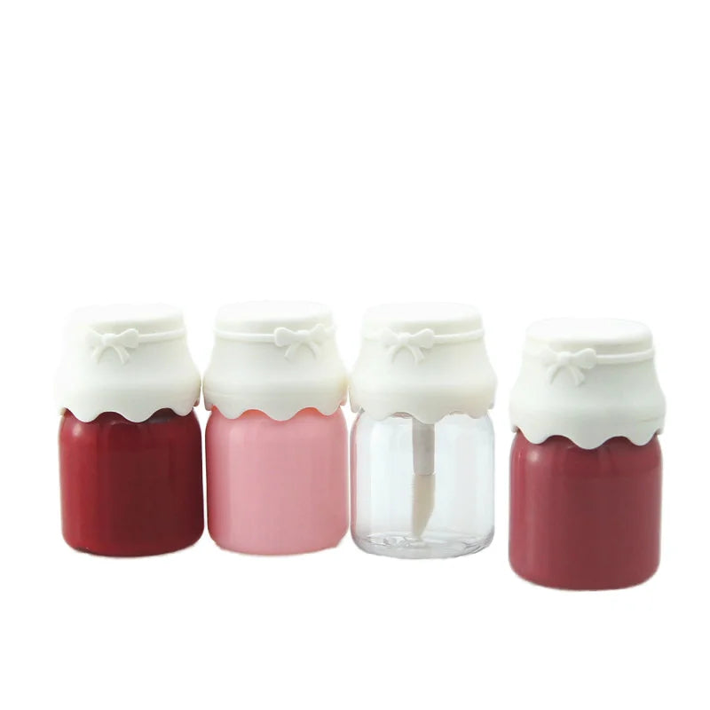 Unique 8ml Small Portable Lip Gloss Packaging Clear Pink Milk Bottle Shape Cosmetic Lip Balm Tube with Plastic Brush Tube