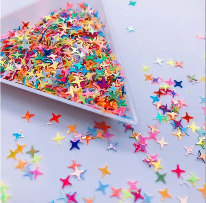 Hot Sale Four-Angle Star Shape Glitter Sequins 3D Nail Art Decorations Mini Shiny PVC Stickers with Diamond and Slime Material