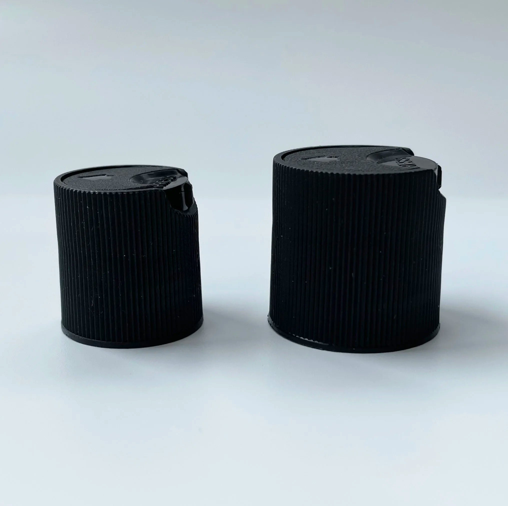 24/410 White Black Ribbed Disc Top Cap With Skirt for 20-410 Neck Finish Plastic Bottles