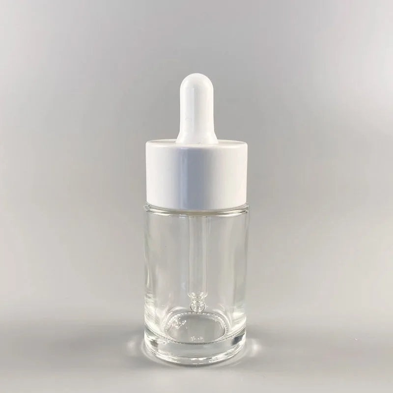 OEM Manufacturer 30ml Transparent Flat Round Glass Essential Oil Serum Dropper Bottle with Double Wall White Dropper