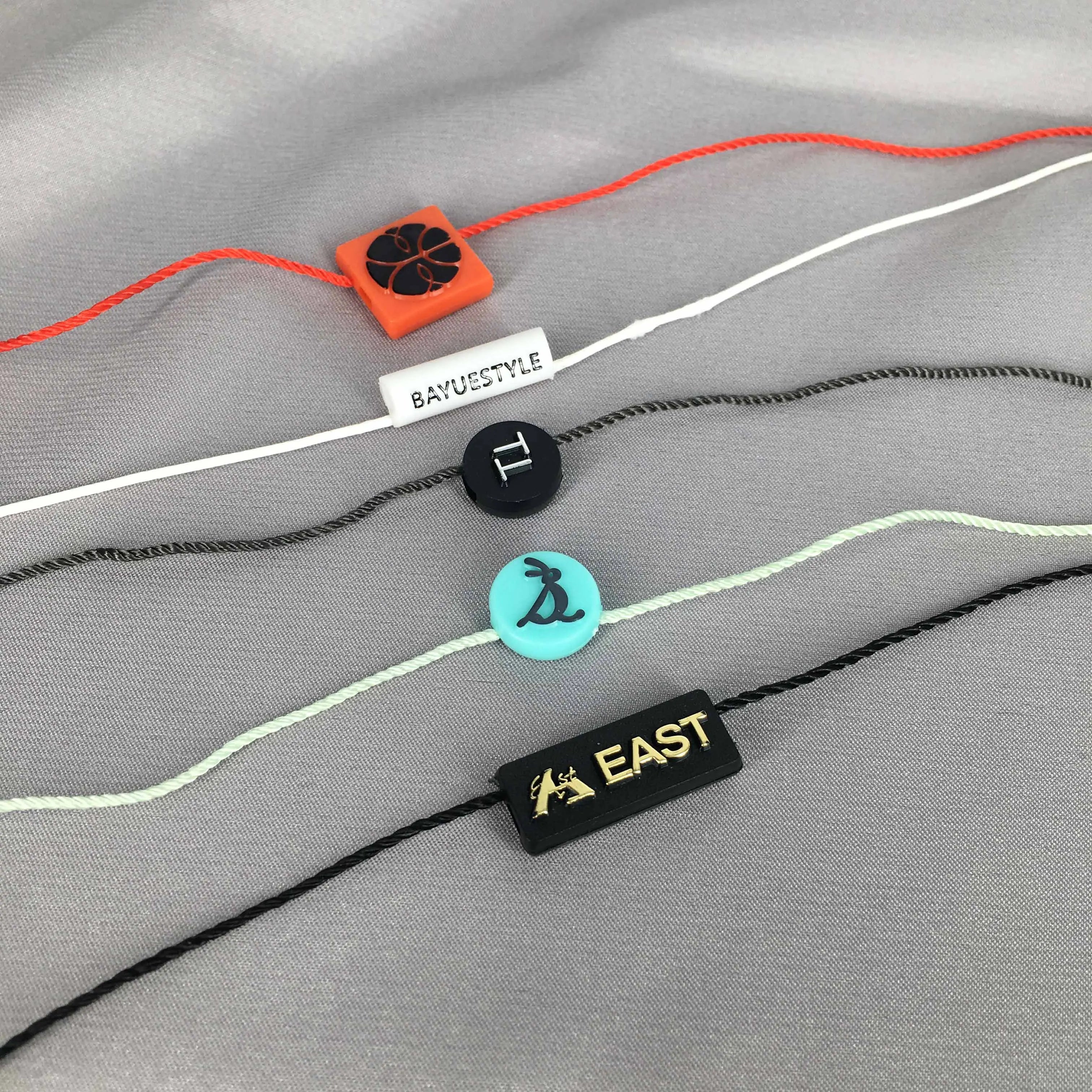 Customizable Cord Tags with Embossed Logo Plastic Seal and Nylon String Watch Tag for Shoes and Bags Own Brand Accessory