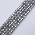 Zhuji Hot Sale 9-10mm Natural Gray Freshwater Pearl Strand Loose Rice Shape Pearls