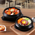 2024 Hot Selling Korean Style Black Ceramic Dolsot Bibimbap Ramen Soup Pots Eco-Friendly Mini Stone Bowls with Tray