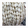 Wholesales Price 16 Inch 10 X 15 mm Diamond Shape Baroque Loose Freshwater Pearl in Strand .