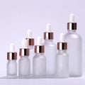 Wholesale Cosmetic Packaging Tube 10ml Rose Gold Color Spray Colored Essential Oil Glass Bottle with Dropper