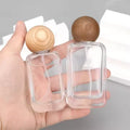 Wholesale 30ml & 50ml Clear Flat Square Glass Perfume Bottle Refillable with Wooden Cap & Screw Neck for Screen Printing