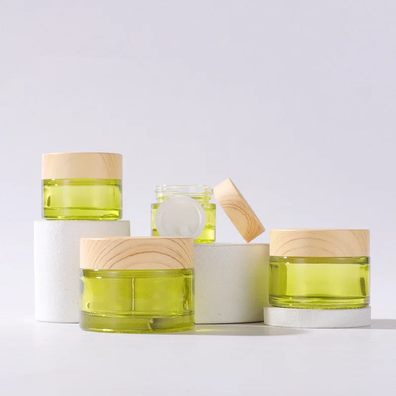 Wholesale Cosmetic Face Skincare Cream Container 10ml 15ml 30ml 50ml Light Green Glass Jars with Lids
