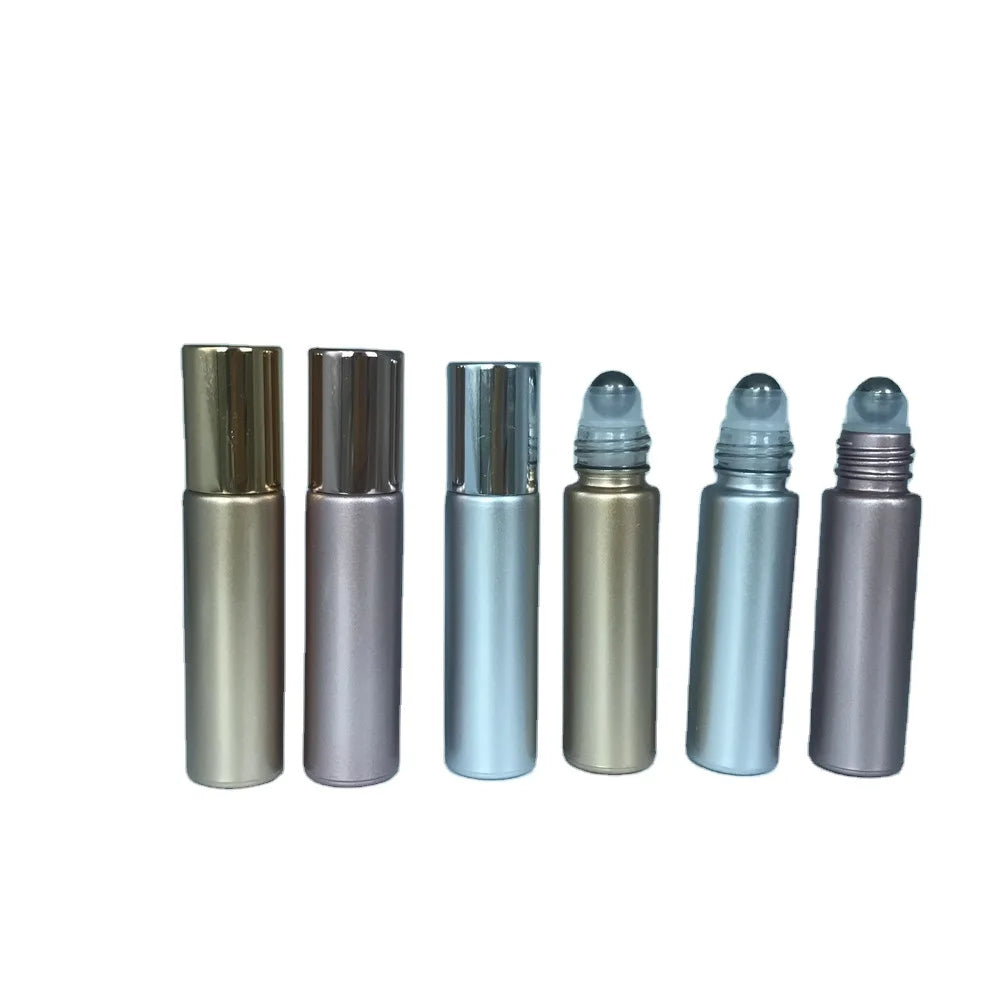 Wholesale Thick Wall 10ml Glitter Rose Gold Metallic Color Roller Glass Bottle with Shiny Rose Gold Cap and Metal Roller on
