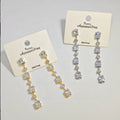 Ilona Gold Silver Plated Copper Baguette CZ Linear Drop Earrings Long Tassel Crystal  Sparkling Party Earrings Jewelry for Women