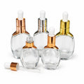 Manufacturer Custom Logo Empty Clear Glass Dropper Bottle for Serum Essential Oil with Gold Cap