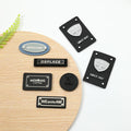 Fashion Custom Brand Clothing Pu Leather Metal Label Patch Engraved logo Nameplate Metal Label Blank Metal logo for Clothing