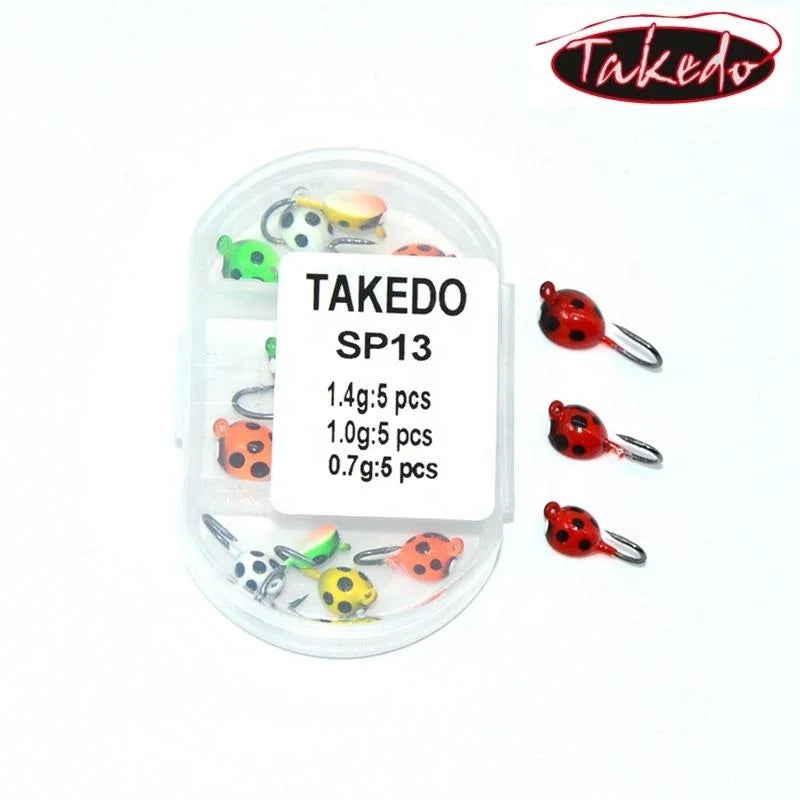 TAKEDO 15pcs Per Box SP13 0.7g 1g 1.4g  Luminous Winter Mini Lead Jig Fishing Jig Head Hook  Beetle Ice Lure Ice Fishing Jigs