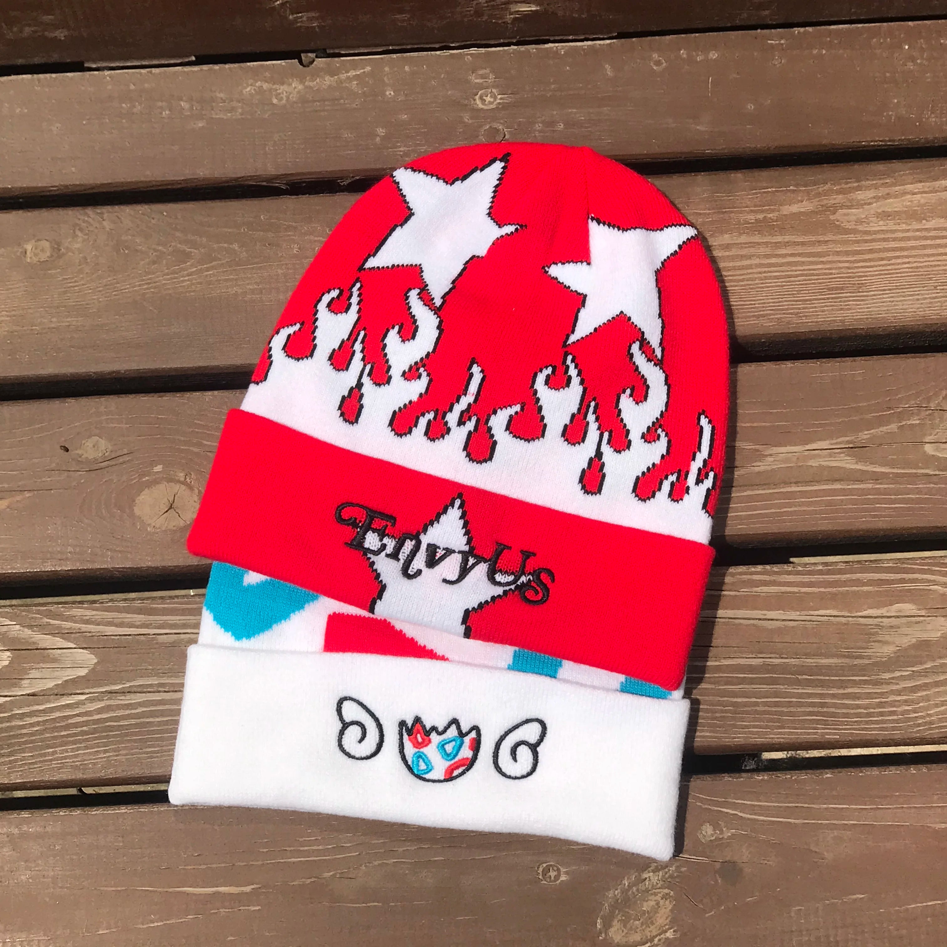 China Warm Gorras Wholesale Knitted Winter Cap  Bennie Hats Knitted Beanie Hat With Leather Patch logo