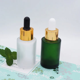 20/415 Flat Shoulder Round Green 1oz Frosted Serum Glass Bottle Dropper with Silver Top
