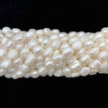Cheap 10-11mm Vertical Hole on Both Sides Smooth Baroque Shaped Loose Pearl Natural Freshwater Pearl