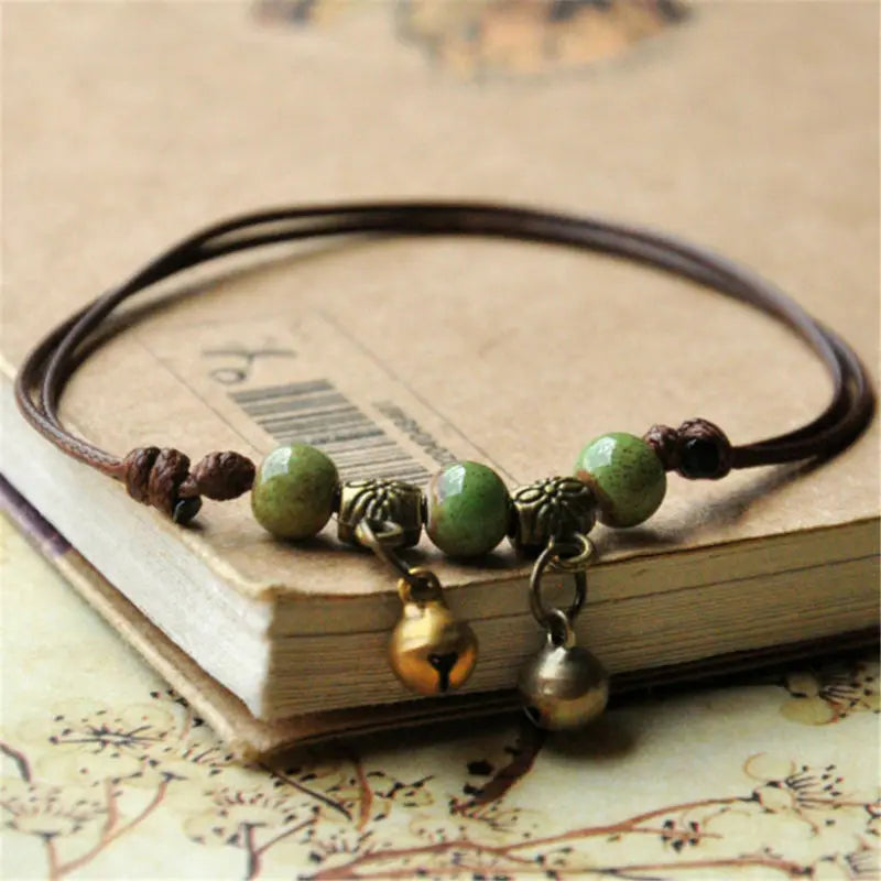 Retro Bell Charm Women Men Anklet Bracelet Ceramic Beads Weave Rope Foot Chain