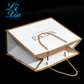Wholesale Customized Printed  Luxury Shopping Gift Cardboard Paper Bag with Handle/luxury Bags Custom logo