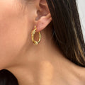2024Dazan New 18k Gold Plated Unique Hypoallergenic Stainless Steel 25MM Vintage Art Style Knotted Polished Earrings for Women